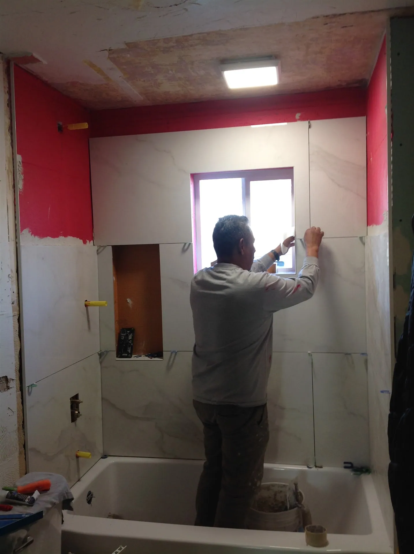 Bathroom during waterproofing before tile installation