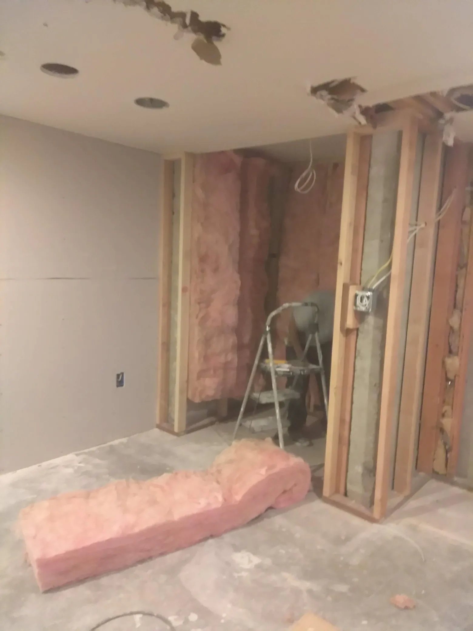 Basement framing with new stud walls in place