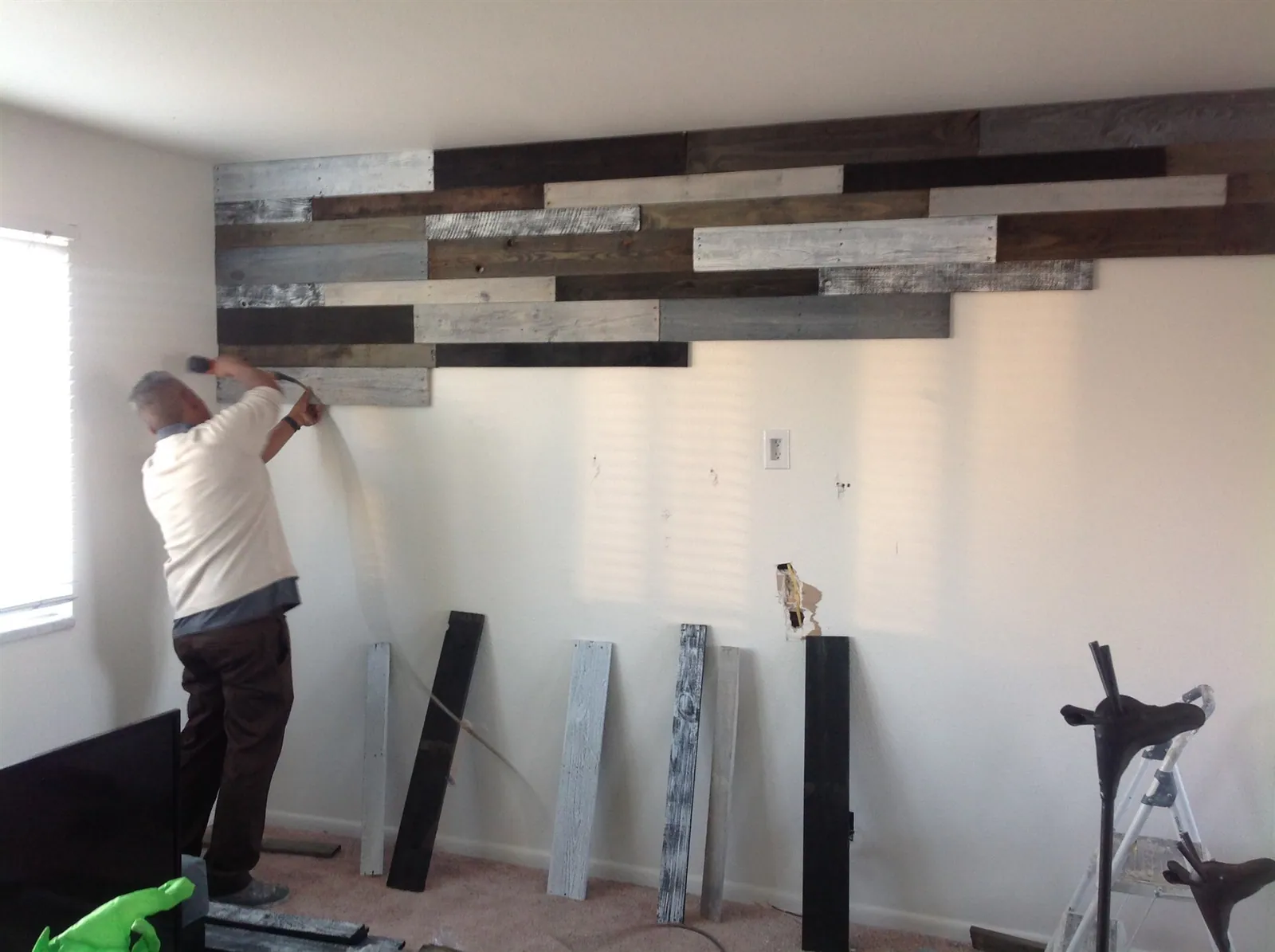 Installing a reclaimed-look plank accent wall