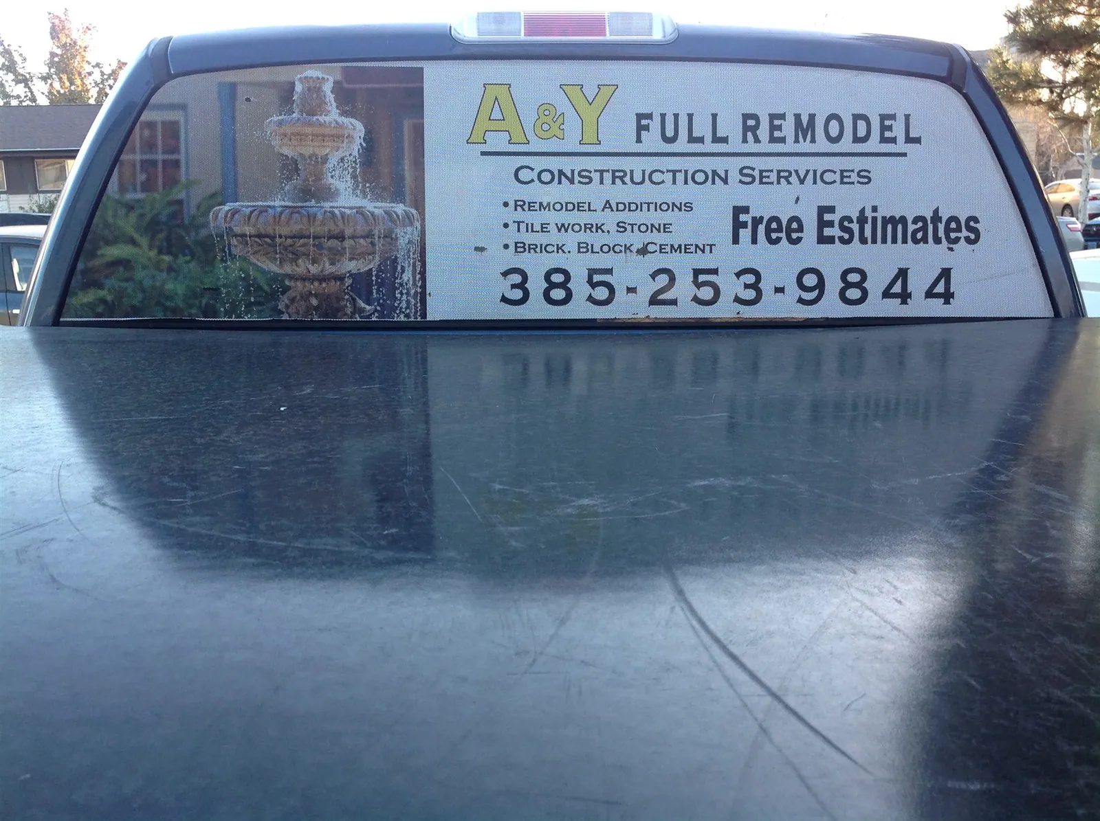 A and Y Full Remodel work truck with company signage